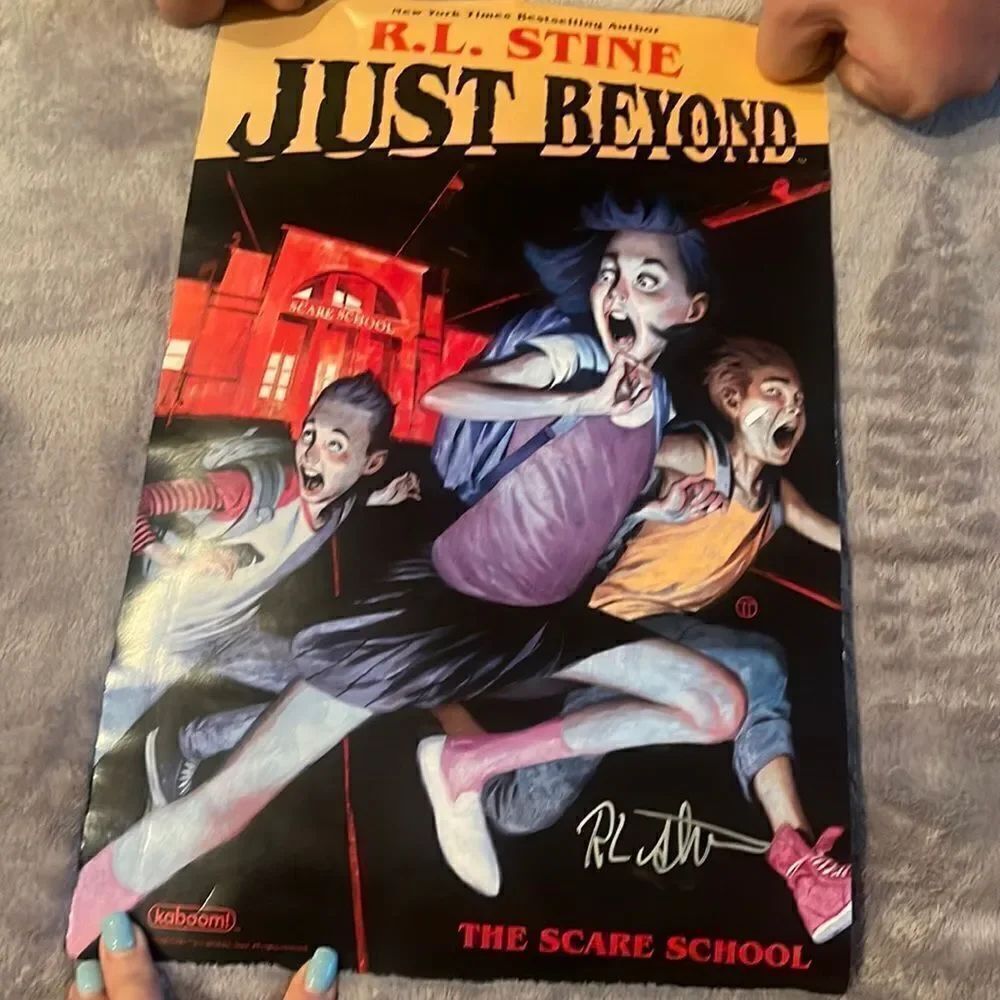 Just beyond the Scare school poster signed by R.L stine